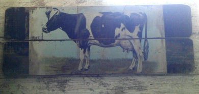 Bessie the cow print on fence board